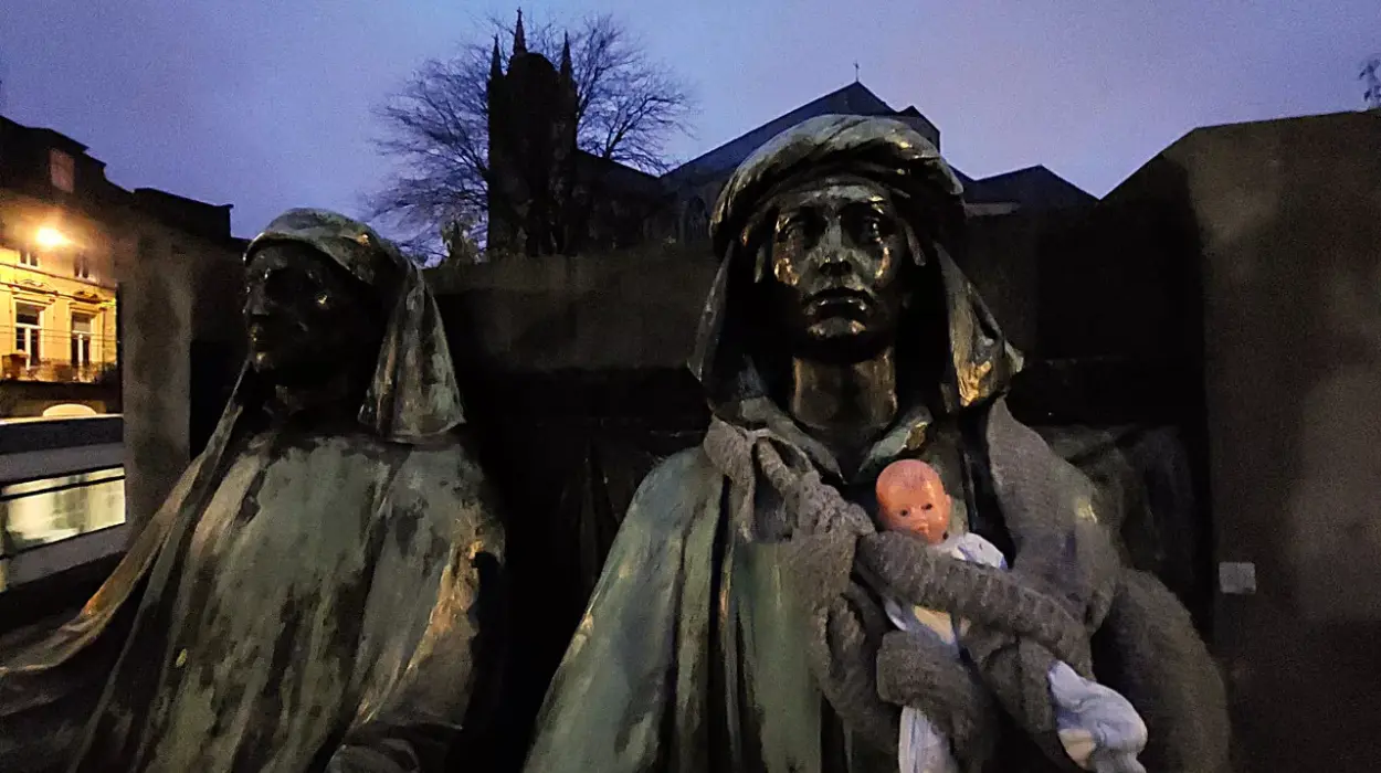 Activists in Ghent Draw Attention to Parenting Inequality by Placing Baby Carriers on Statues of Famous Men
