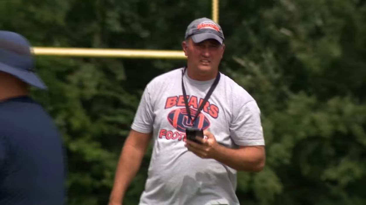Virginia football coach wanted on child pornography and other charges is missing